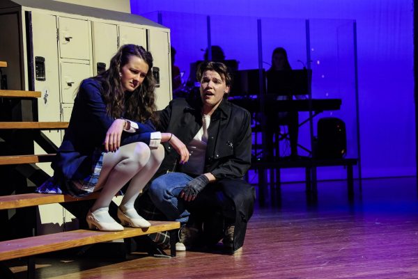 In their roles as Veronica Sawyer and Jason Dean, seniors Kate Vanatta and Eddie Tyler discuss the results of their actions. Heathers is one of three shows Tower Theater put on this season to raise awareness of controversial topics. Photo courtesy of Cheri Schonfeld 